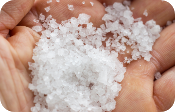 hands holding high-quality sea salt