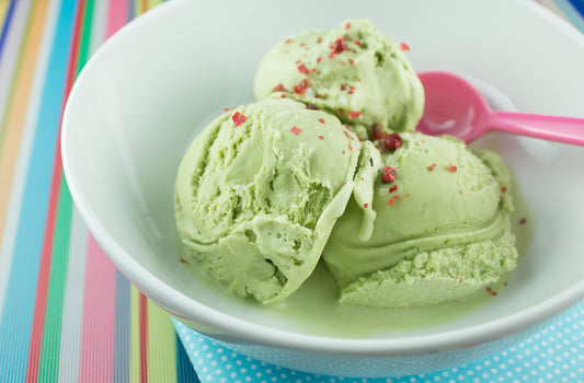 avocado oil gelato in a bowl with a spoon