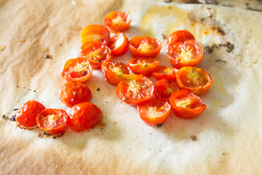 cherry tomatoes on a sheet pan