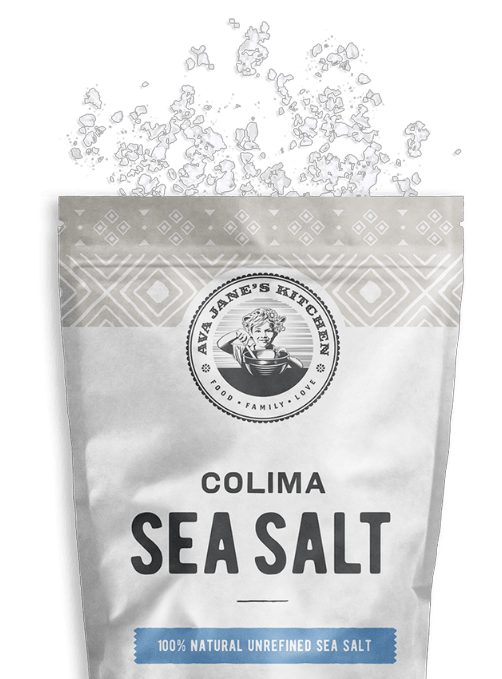 Bag of Ava Jane's Kitchen's Colima Sea Salt with Salt sprinkled above it on a white backgroun