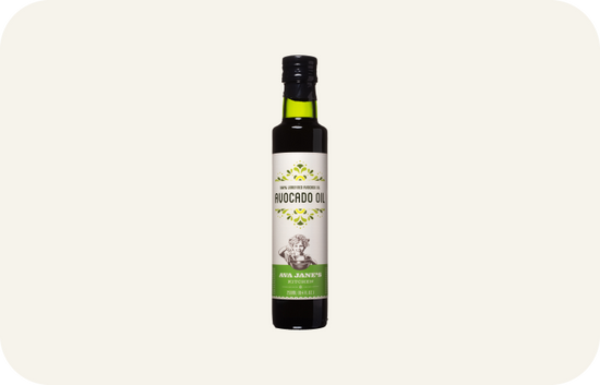 One bottle of Avocado Oil on a cream background