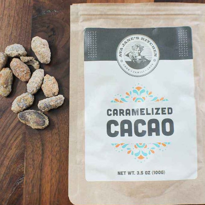 A bag of Ava Jane Kitchen's Caramelized Cacao sitting on a wooden table.